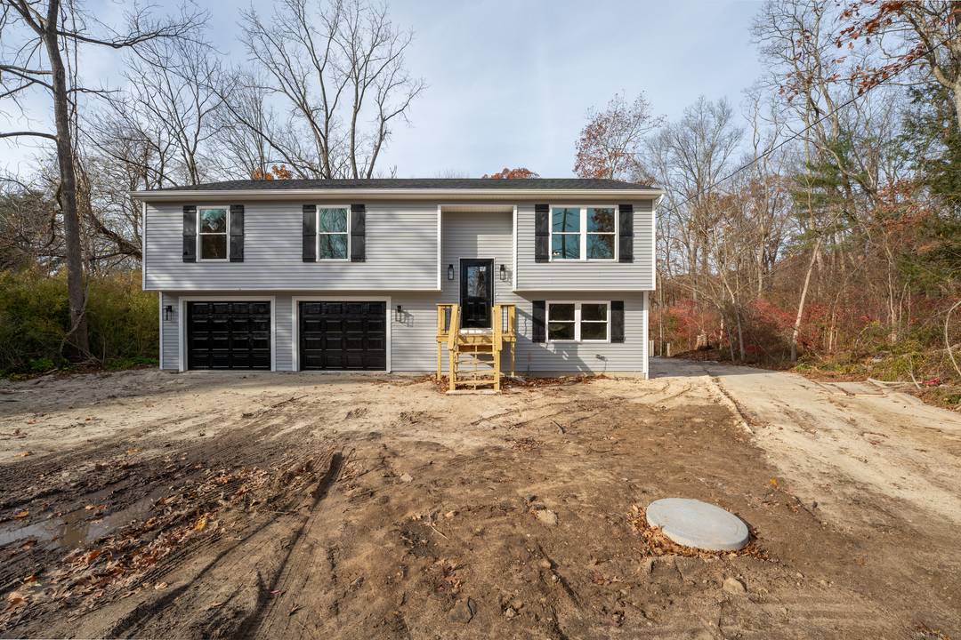 Beautiful new construction raised ranch located on a quiet dead end street overlooking the river.