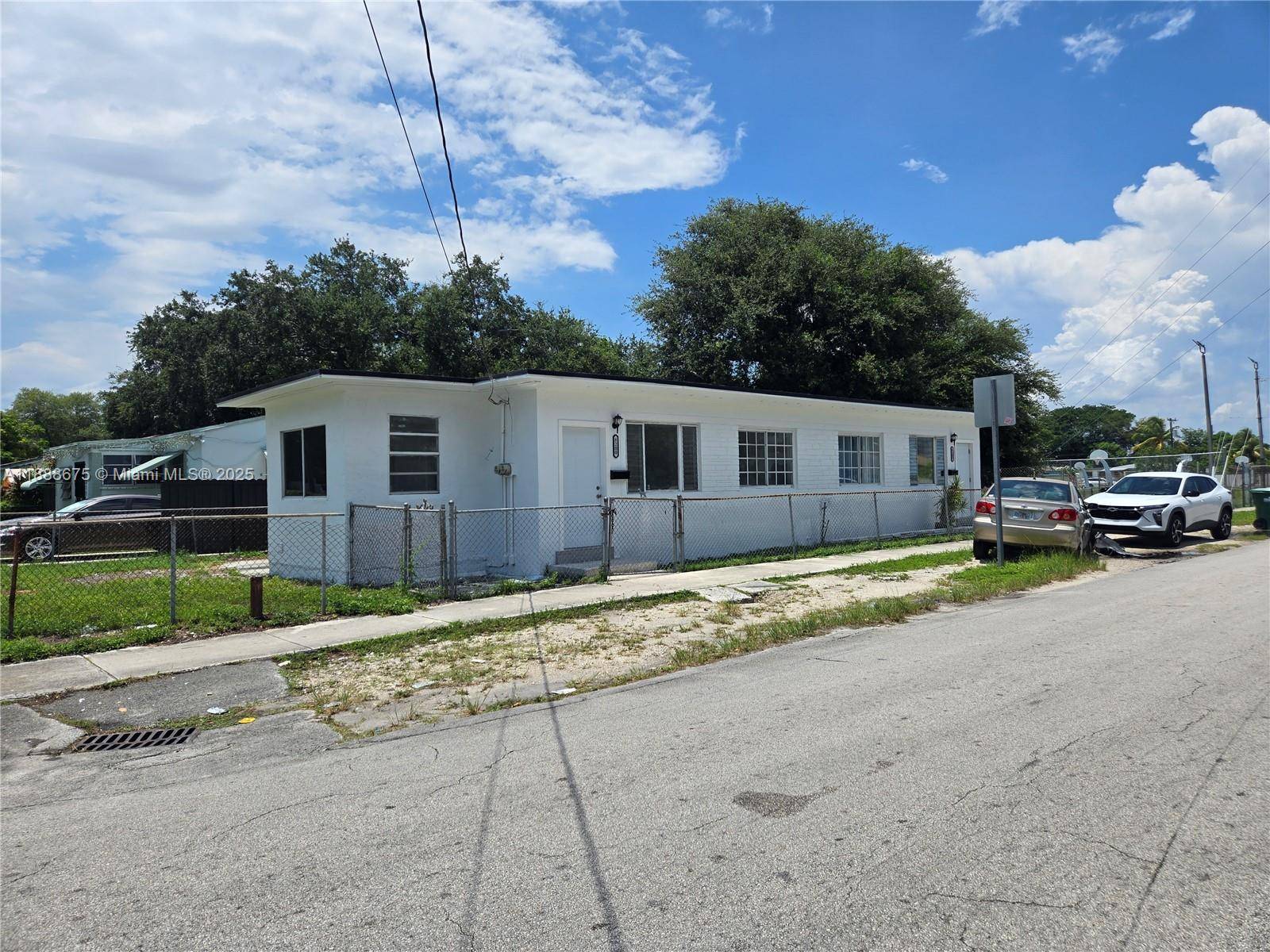 This remodeled duplex offers an exceptional blend of modern elegance and functional design.