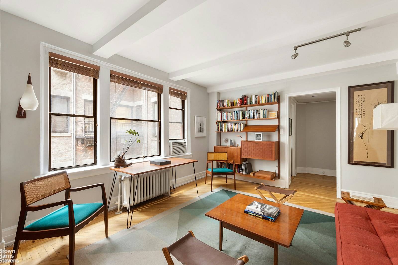 Chic pre war one bedroom corner apartment with sunny south and east exposures on coveted lower Fifth Avenue.