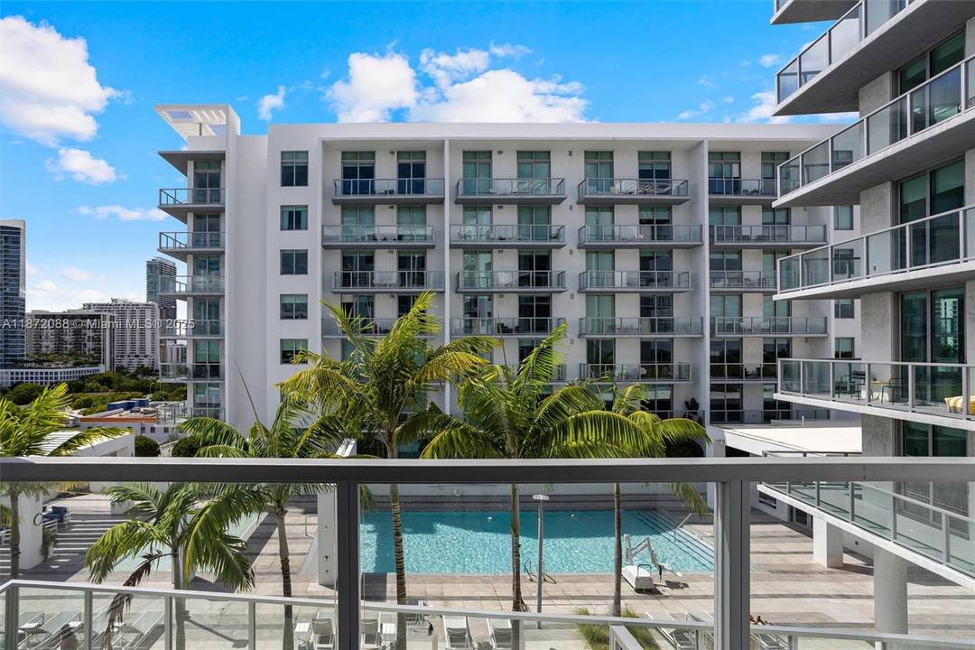 Live the Miami lifestyle at Quadro a turnkey, furnished residence with a rare den that acts like a second bedroom, giving you more flexibility and stronger income potential than standard ...