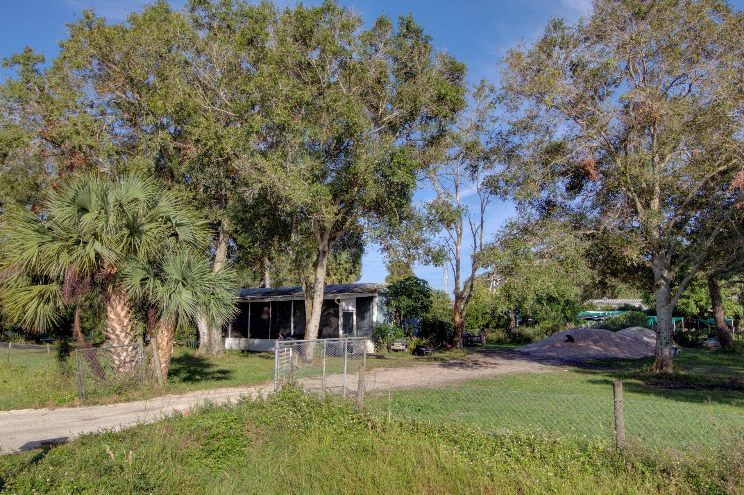 6055 NE 9th Way Palm Beach