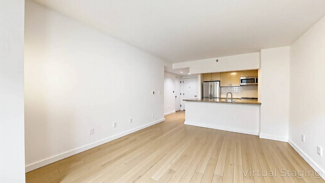 Spacious and bright, this two bedroom, two bathroom residence offers a modern layout with fantastic natural light through west facing windows overlooking Adam Clayton Powell Jr.