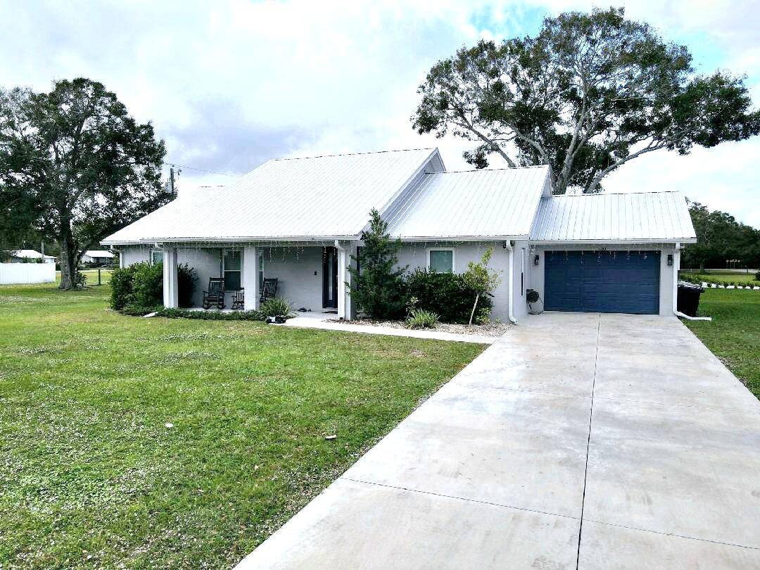 Gorgeous, 3 Bedroom 2 Bathroom 1 car garage custom built CBS home with a metal roof.