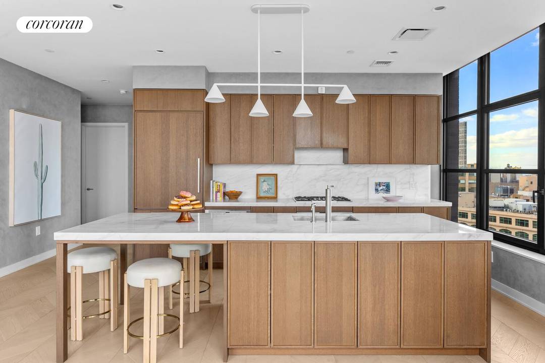 High on the 16th floor, this river facing corner two bedroom at Front amp ; York has been fully customized with elevated, design driven upgrades rarely seen in the building.