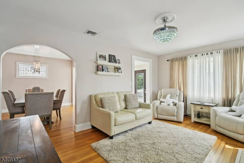 Welcome to this beautifully designed four bedroom, three bath home where every detail has been thoughtfully curated for comfort, style, and functionality.