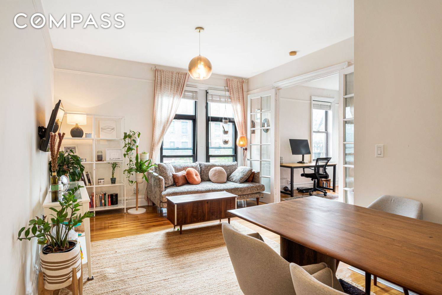 This charming prewar two bedroom home office or easily convertible three bedroom apartment features oversized windows in the main living spaces and a recently renovated kitchen and bathroom.