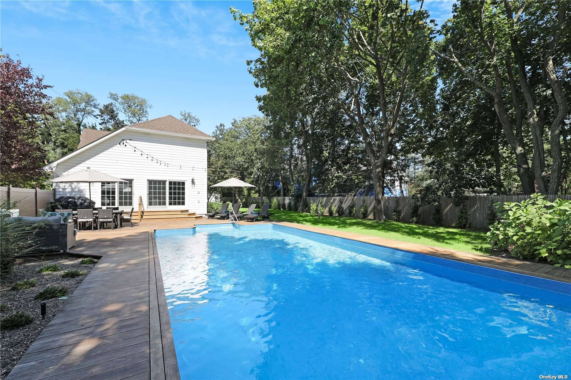Located south of the highway, this fully renovated immaculate Westhampton gem is ready for summer of 2024.