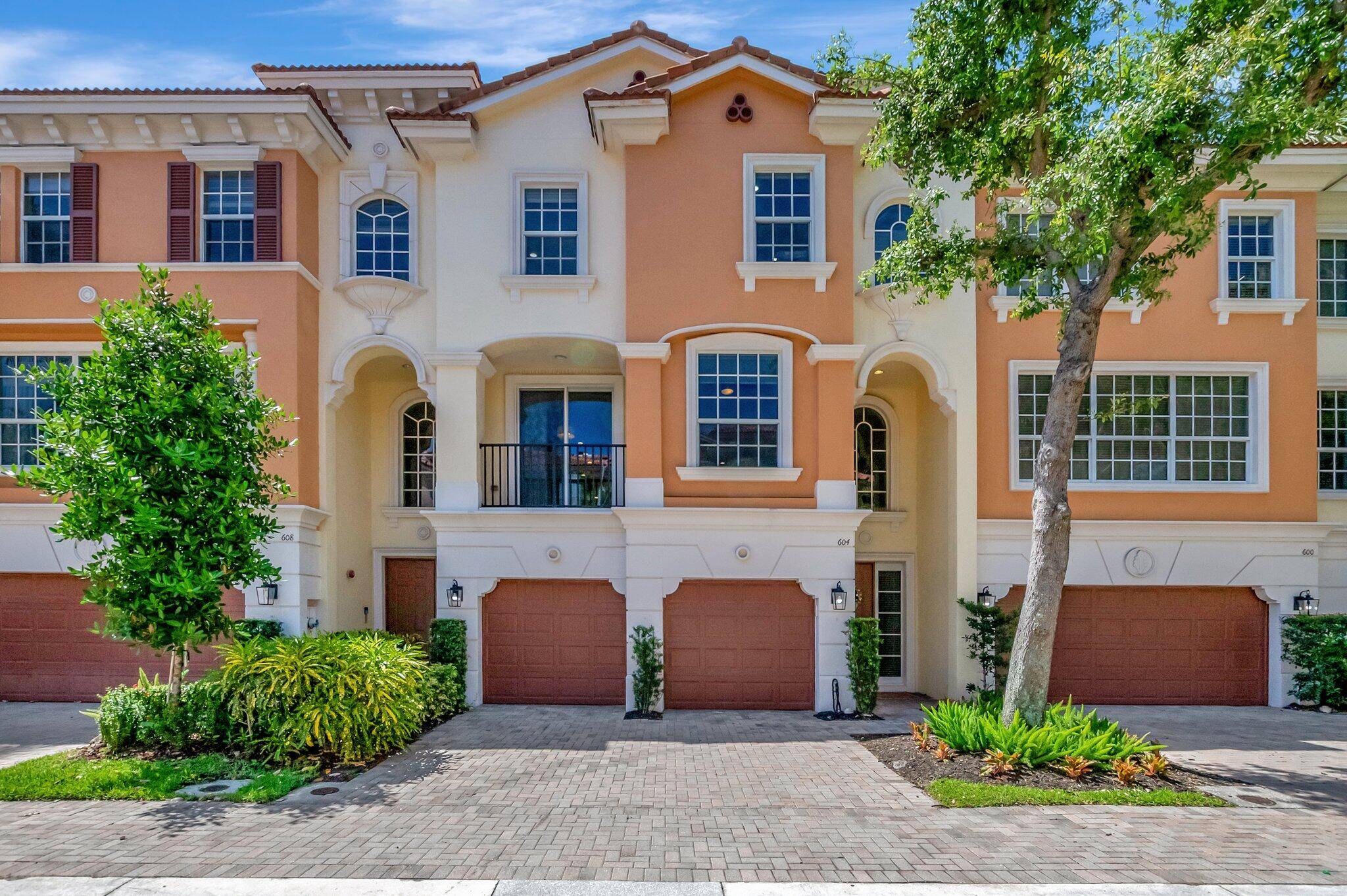 Experience luxury living in this beautifully renovated three story Toll Brothers townhome in East Boca's gated Trieste community.