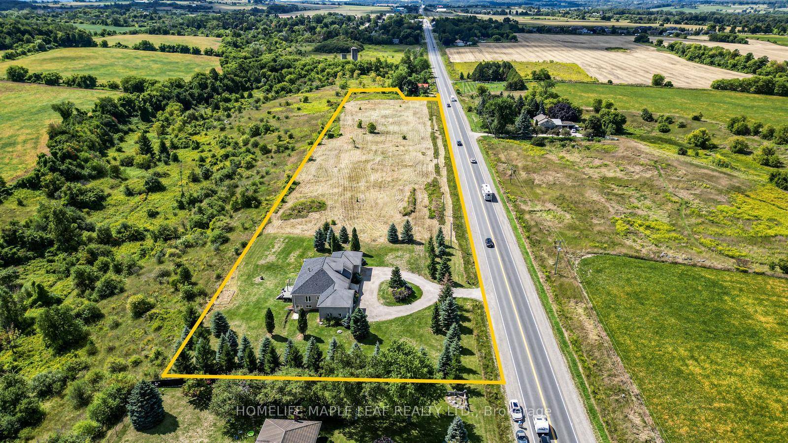This beautifully maintained 3 bedroom bungalow sits on 5.
