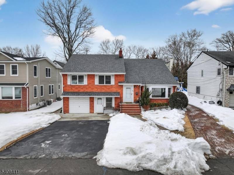 Spacious and versatile residence offering seven bedrooms and four full bathrooms, providing exceptional flexibility and generous living space with a whole house generator.