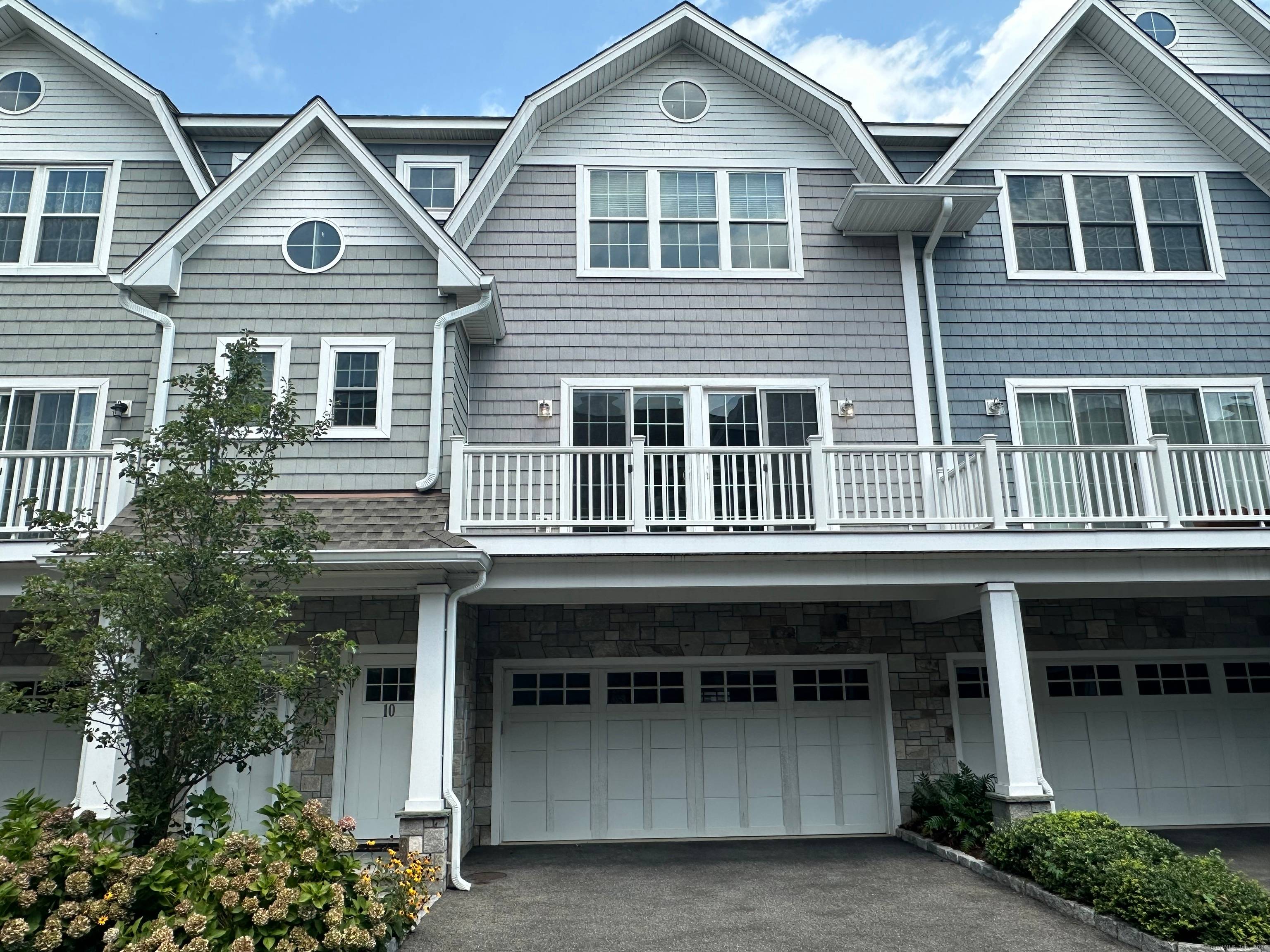 Nantucket Style 2016 built Townhome with modern day amenities and convenience to shopping including Whole Foods, beaches, restaurants and Metro North Train.