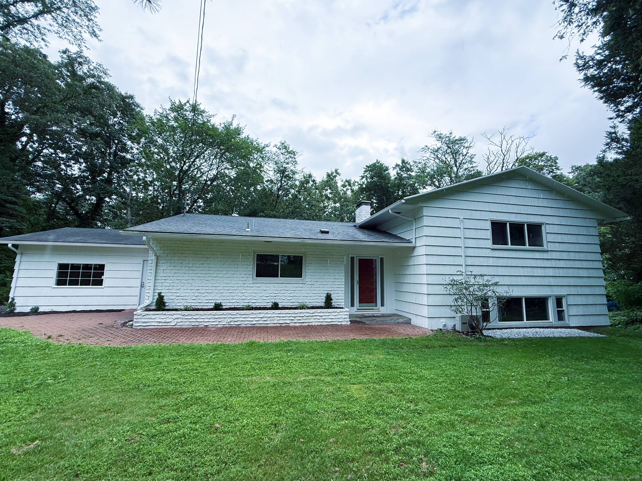 Welcome to 182 Knoll Drive, a beautifully maintained 3 bed, 2 bath home tucked away on a tree lined street in Hamden, CT.