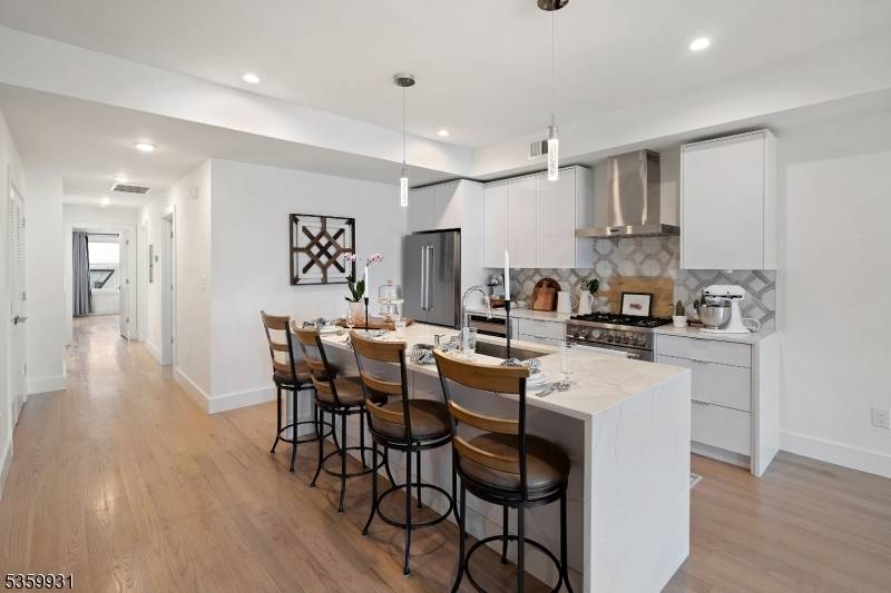 Discover high end living in this spacious 3 bedroom, 2 bath condominium nestled in the sought after Jersey City Heights neighborhood.