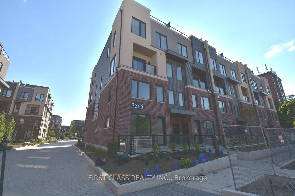 Discover luxury living in this impeccably upgraded newly built 2 bed, 3 bath stacked townhouse in prime Mississauga.