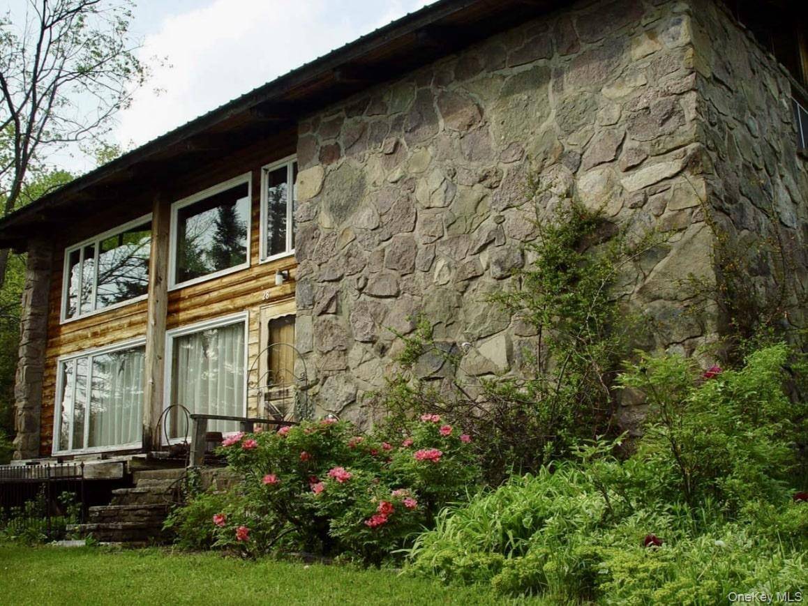 Welcome to a truly special property designed as a replica of a classic chalet in the ski region of St.