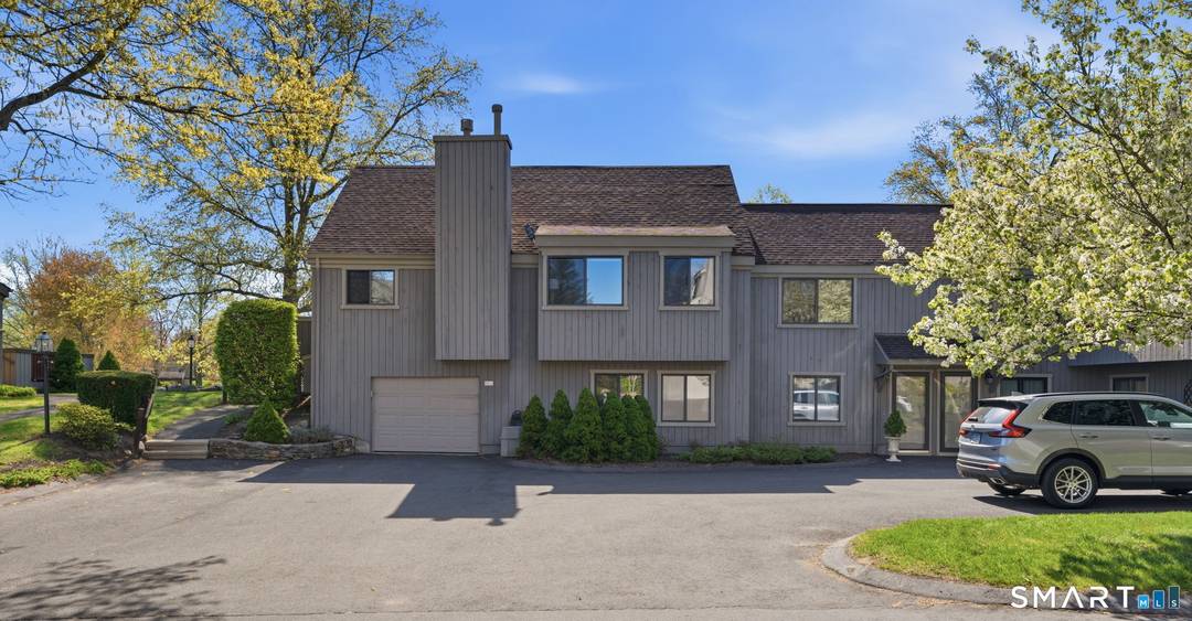 Experience the pinnacle of refined living in this rare, expanded Whittier nestled within the highly coveted Oronoque Village !