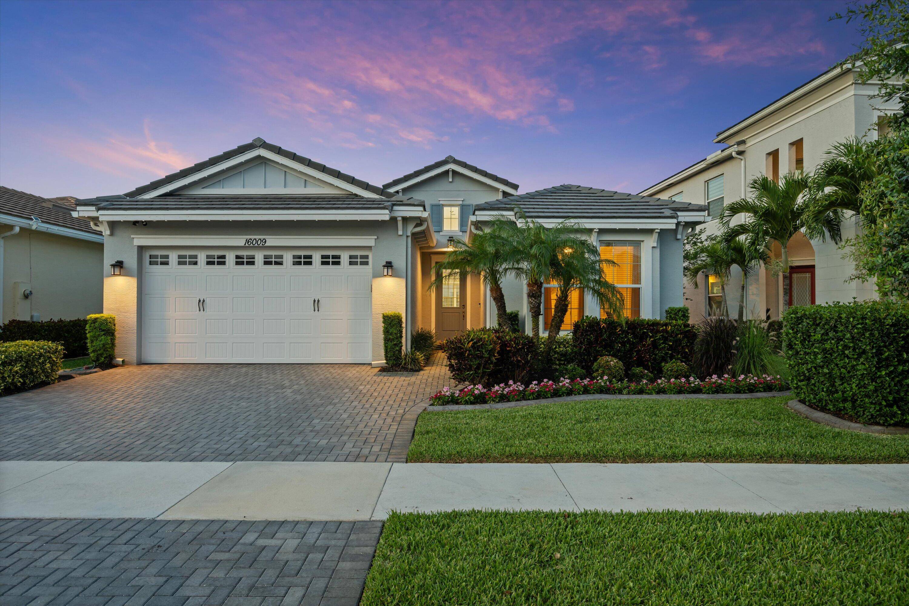 Welcome to this beautifully upgraded Aster 1 model nestled in the prestigious Hammocks community of Westlake, FL.