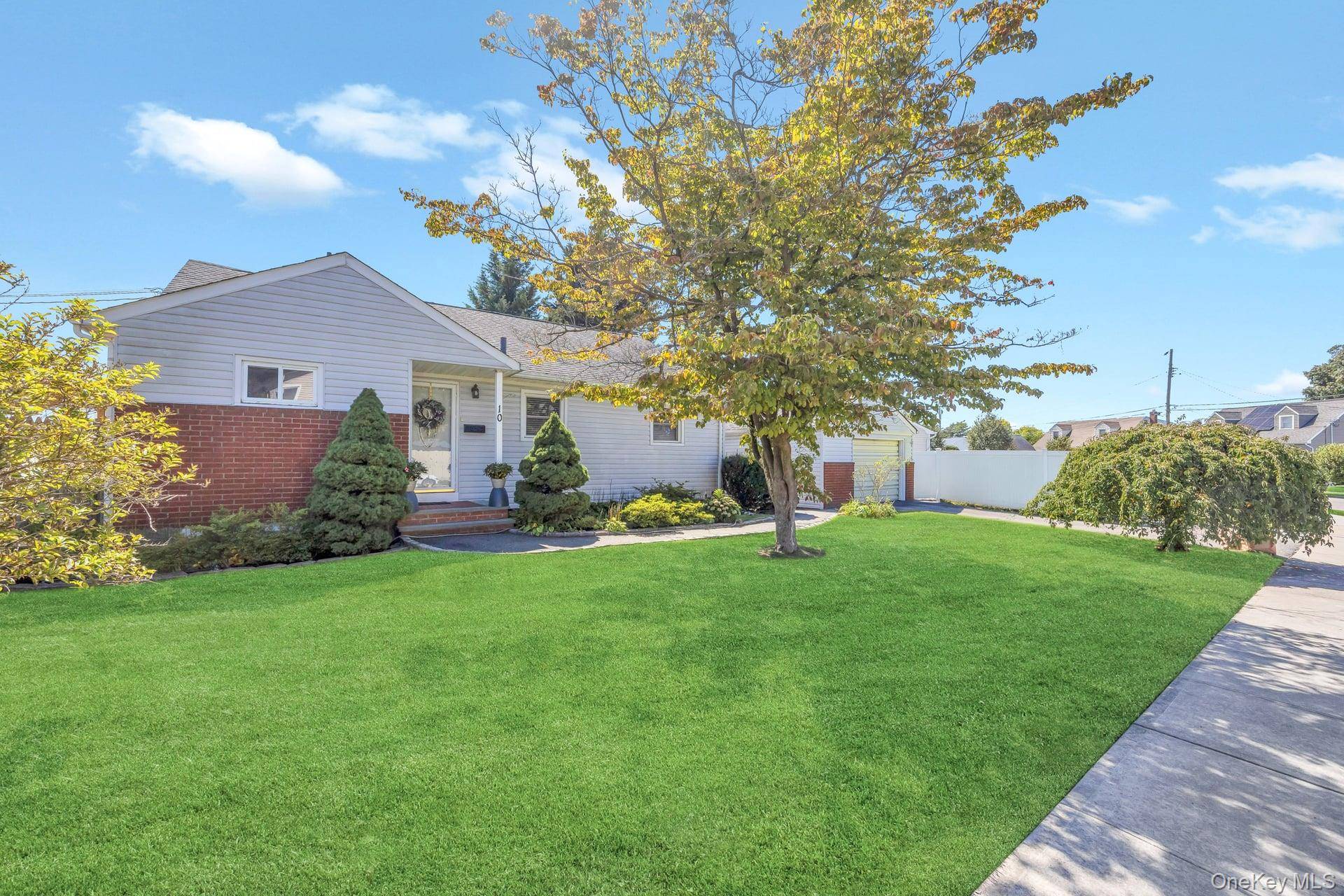 Step into this Splendid Ranch house in Hicksville, where style, comfort, and functionality come together seamlessly.