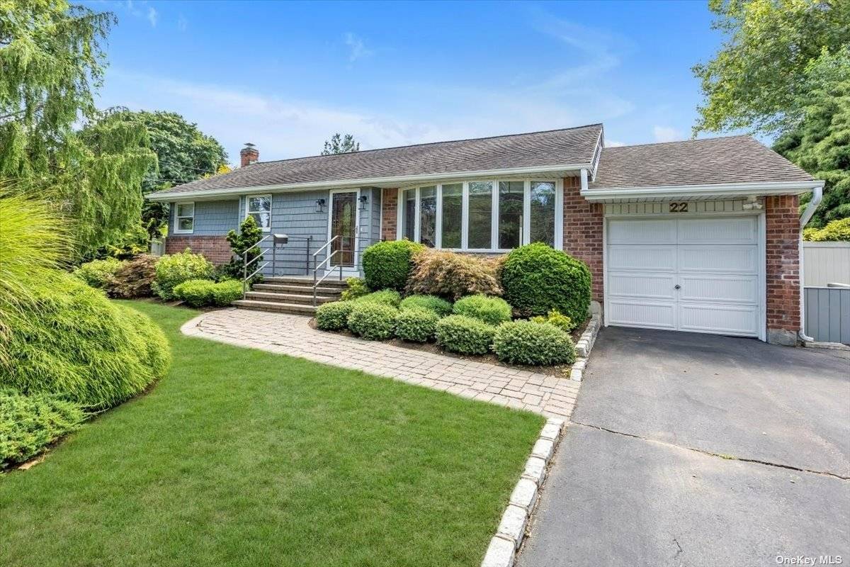 Welcome to your dream home in the heart of Greenlawn, nestled within the Elwood School District, a community known for its warm ambiance and friendly neighbors !