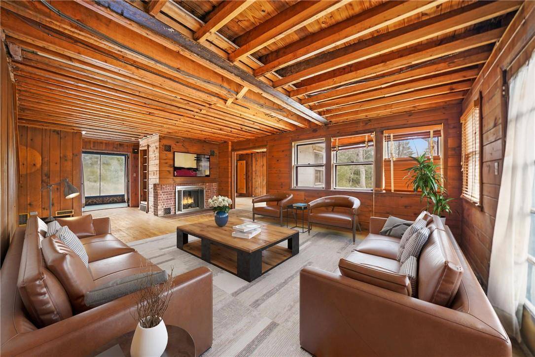 Welcome to a truly extraordinary opportunity to own a piece of history and a slice of natural paradise with this remarkable historic Lakefront home.