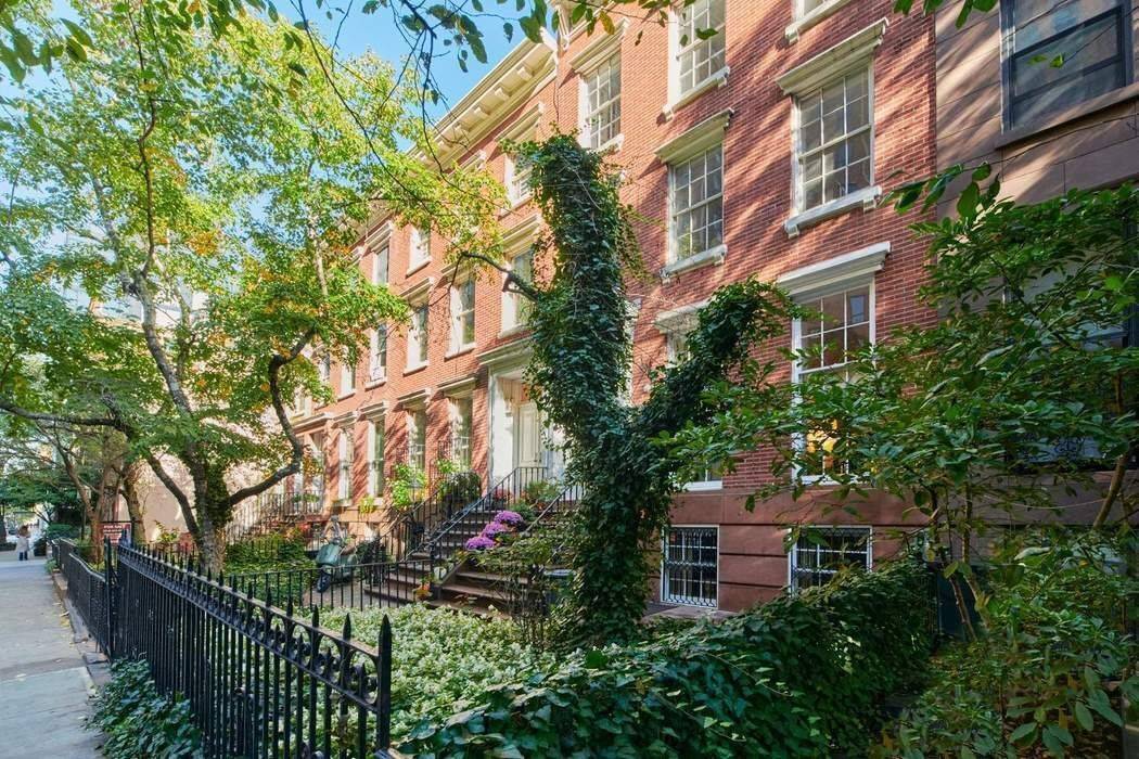 Perfectly poised on a charming, tree lined block in the heart of West Chelsea, this exceptional 21 foot wide architecturally significant townhouse radiates warmth, style, and sophistication.