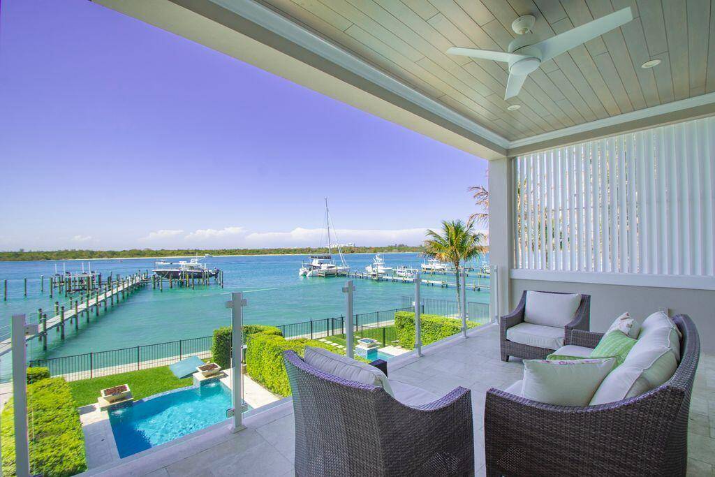 Rare 3 story luxury waterfront smart home in Inlet Palms on Hutchinson Island !