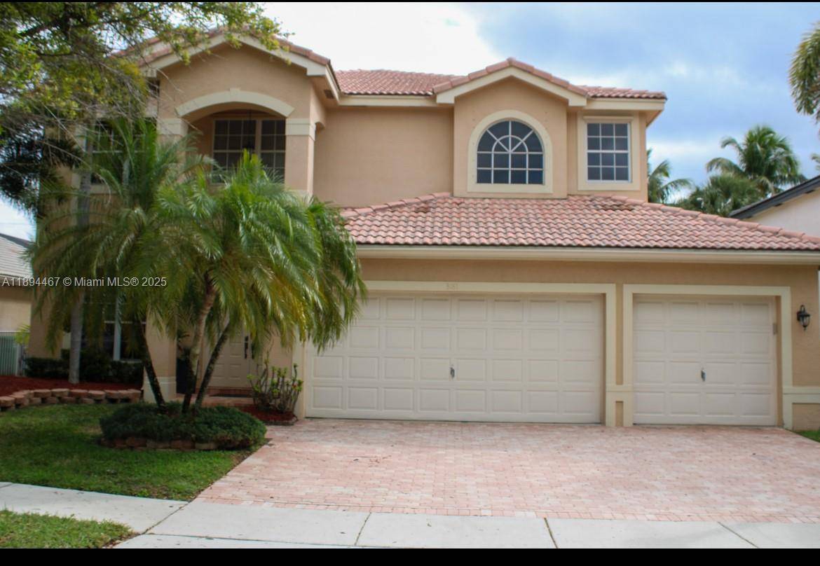 Spectacular lakefront Pool home with New roof, Impact windows doors.