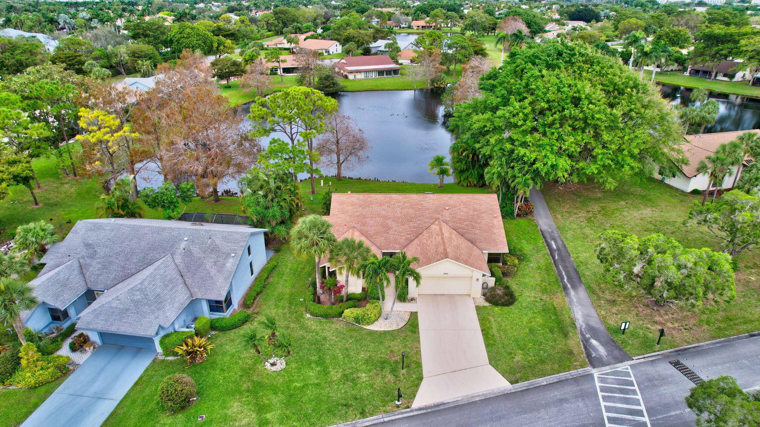 Magnificent lake view 2 bedroom, 2 bathroom, 2 car garage home.
