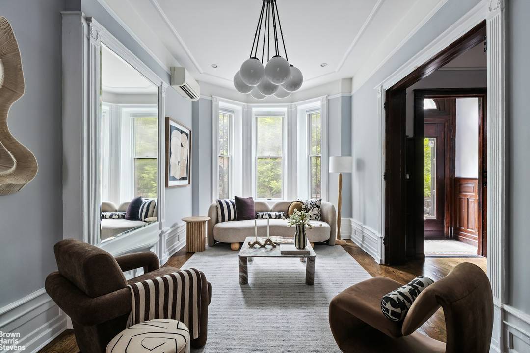 Experience refined Brooklyn living in this beautifully reimagined Crown Heights townhouse with sophisticated updates across four sun filled floors.