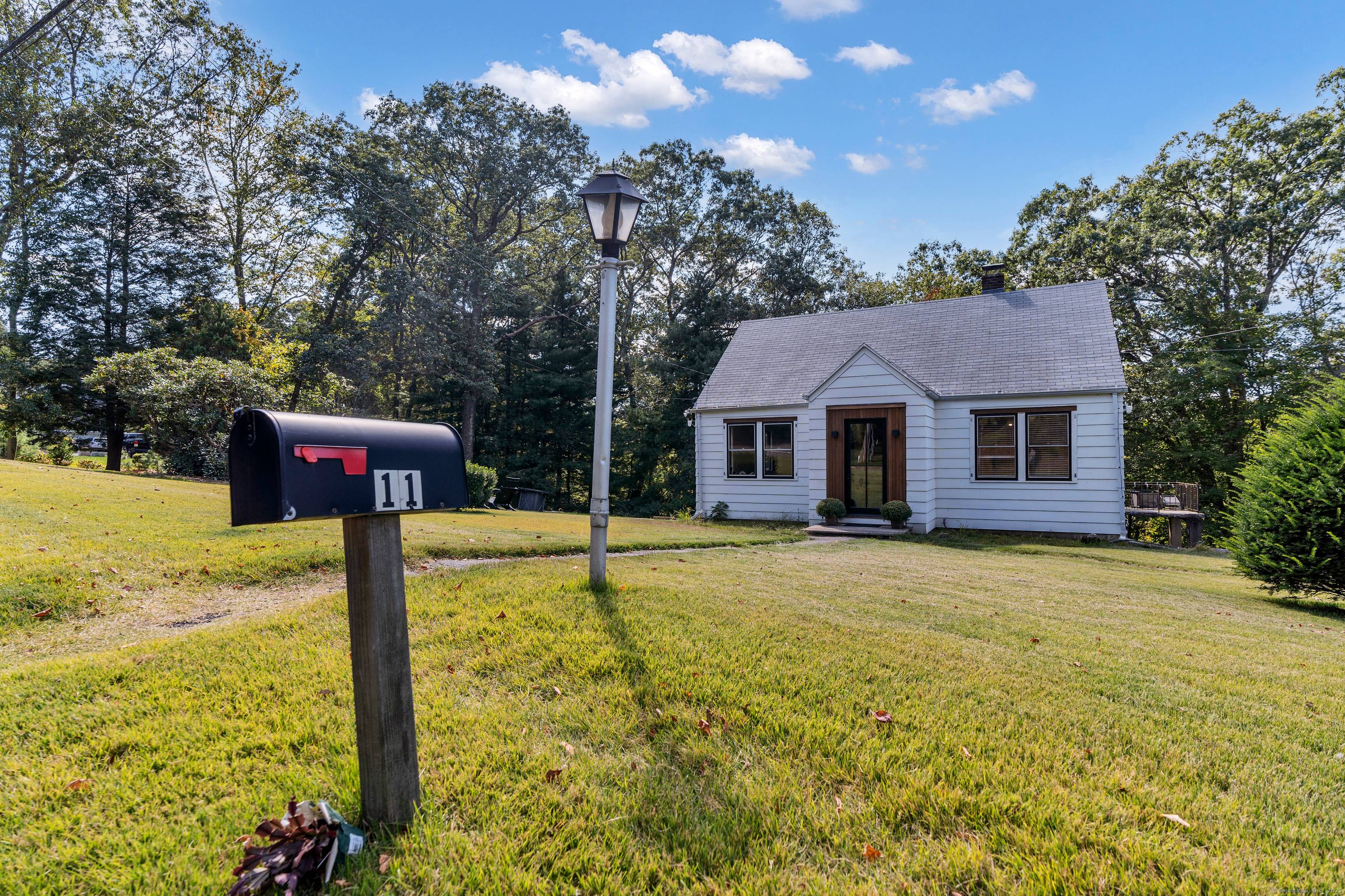 Welcome to this charming Cape in the heart of Shelton.