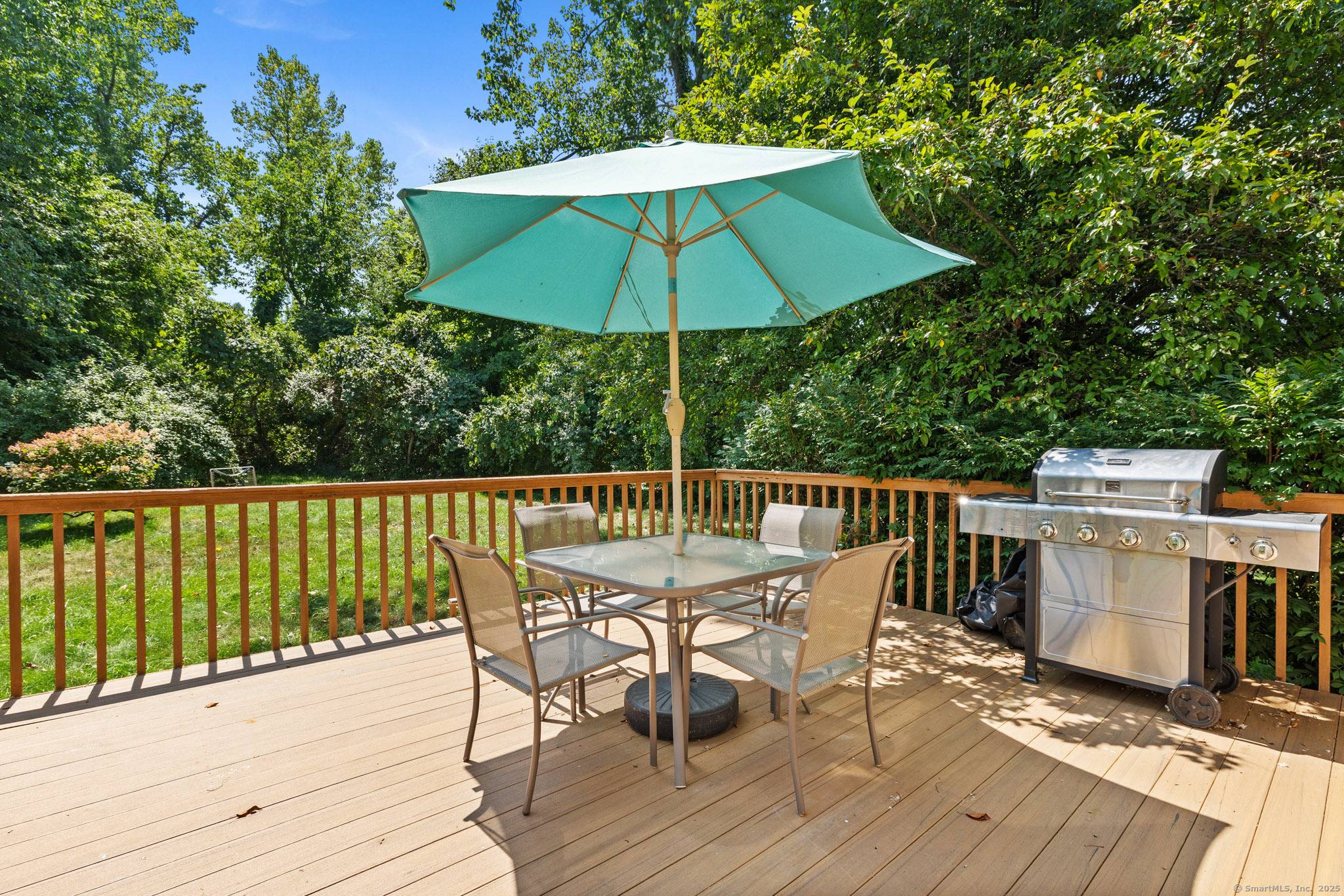 Welcome to this beautifully maintained Colonial nestled in a serene setting backing to town owned land.