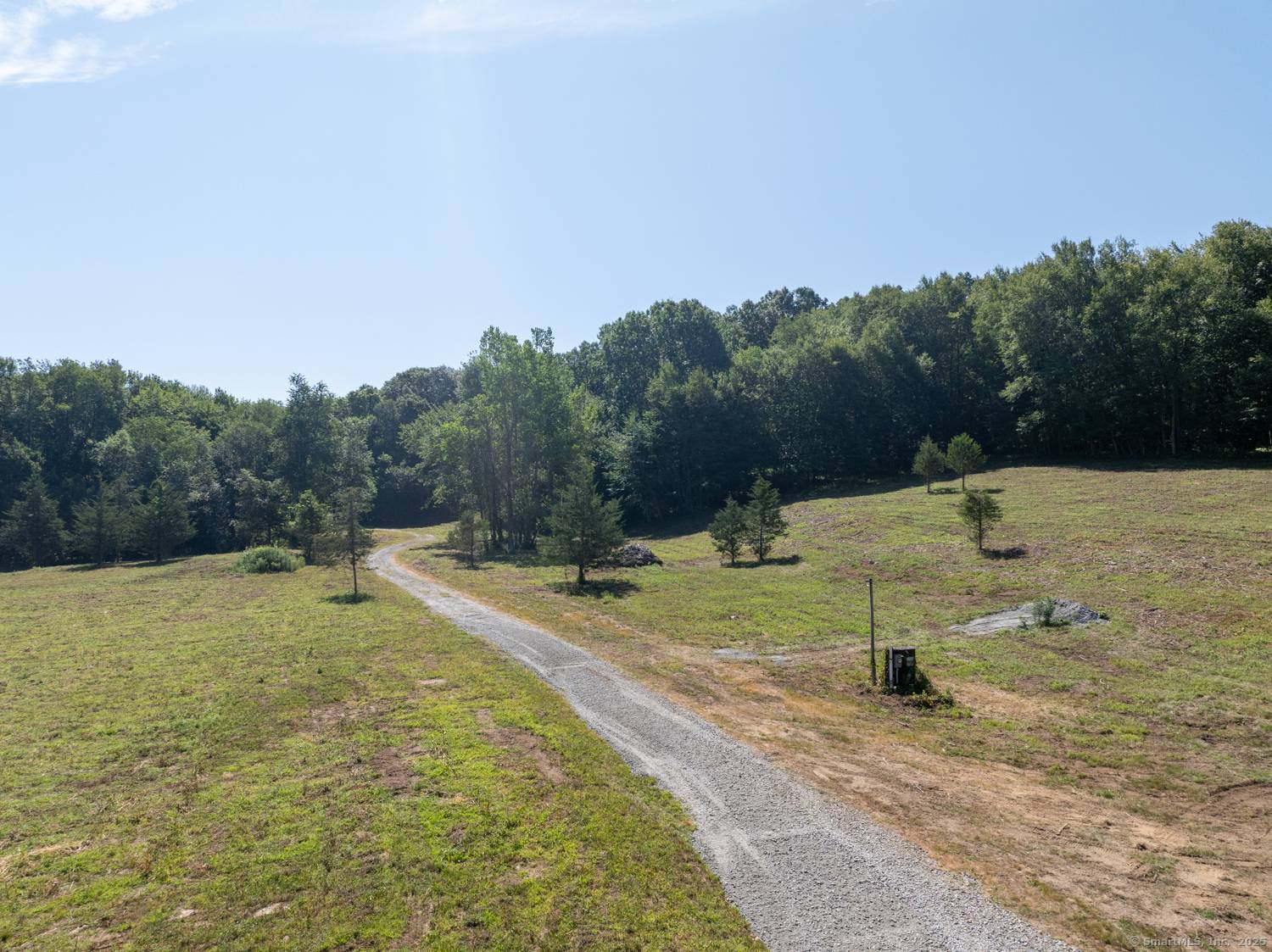 Welcome to 40 Caverly Mill Road, where nearly 86 acres of unspoiled natural beauty await.