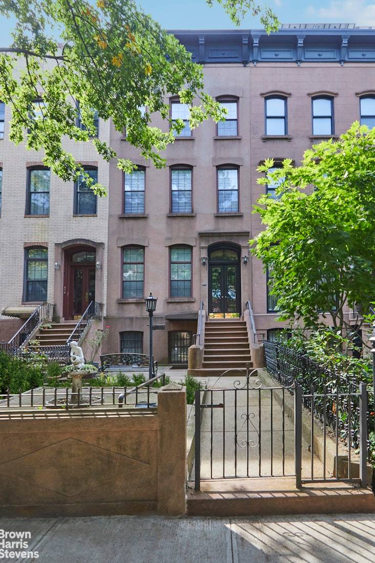 Welcome to this stunning five story brownstone located in the highly sought after neighborhood of Carroll Gardens.