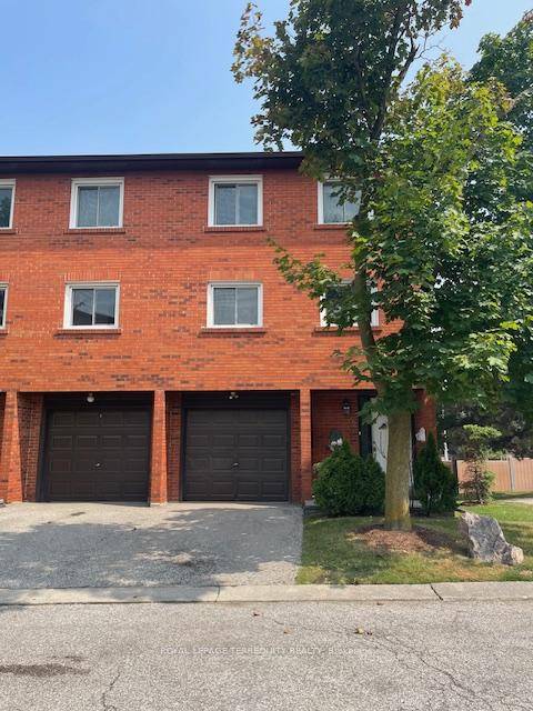 Welcome to this bright and spacious corner end unit with side yard in Rockwood Village.