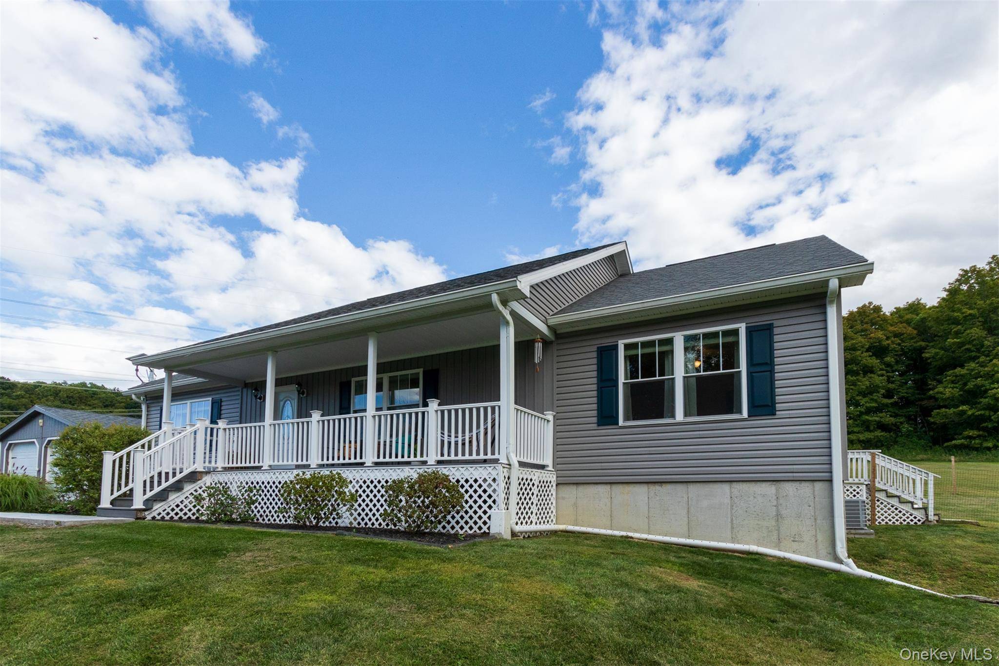 Nestled on a gracious 4. 38 acre parcel distinguished by privacy and gentle slopes, this impeccably crafted ranch home exemplifies modern comfort and understated elegance.