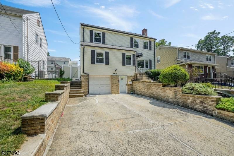 Located in Newark's highly desirable Forest Hill neighborhood, this beautiful home offers incredible space and modern upgrades right across from Branch Brook Park !