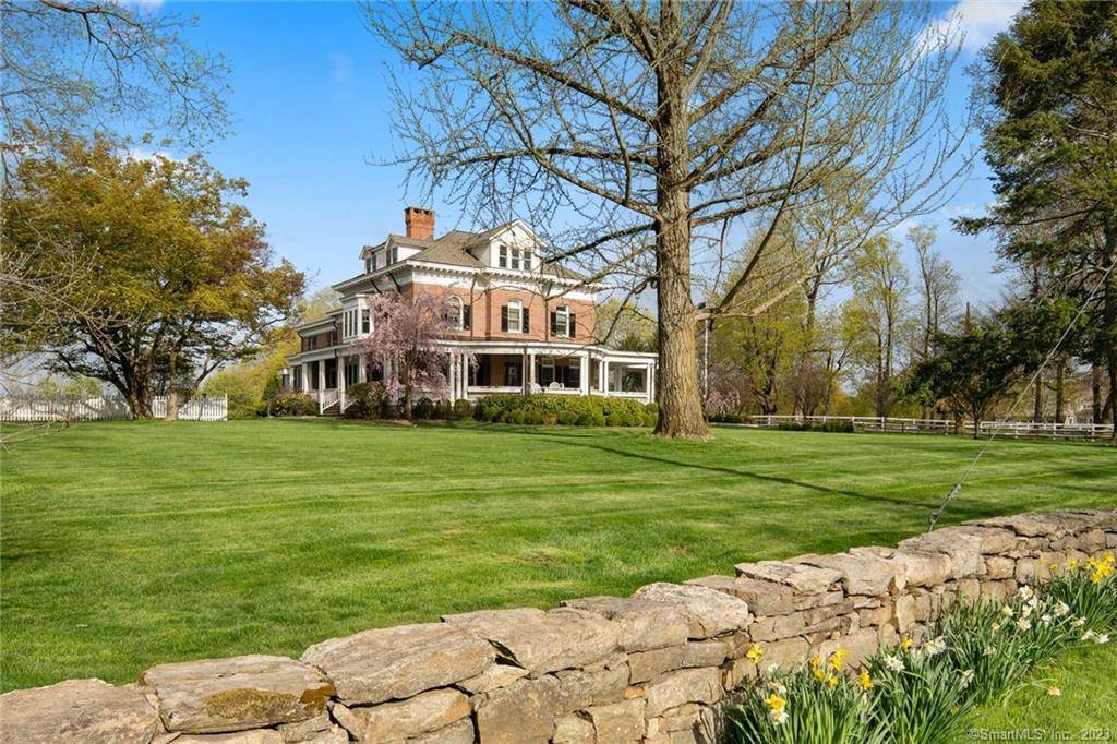 The Legacy Estate An Oenoke Ridge Masterpiece The main brick residence captures the essence of Gilded Age elegance with 10 12 ft ceilings, eight fireplaces, a classic wrap around porch, ...