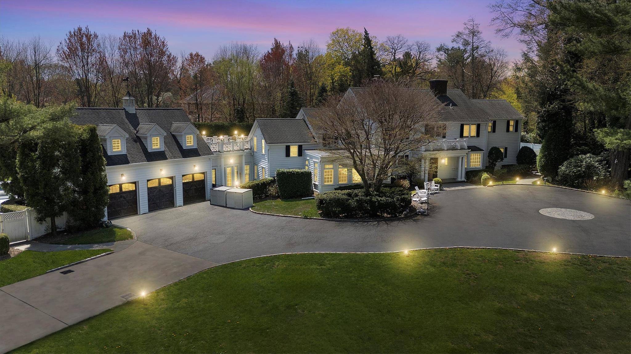At the end of a long private driveway the exceedingly charming Georgian Colonial aptly styled Twin Pines awaits.