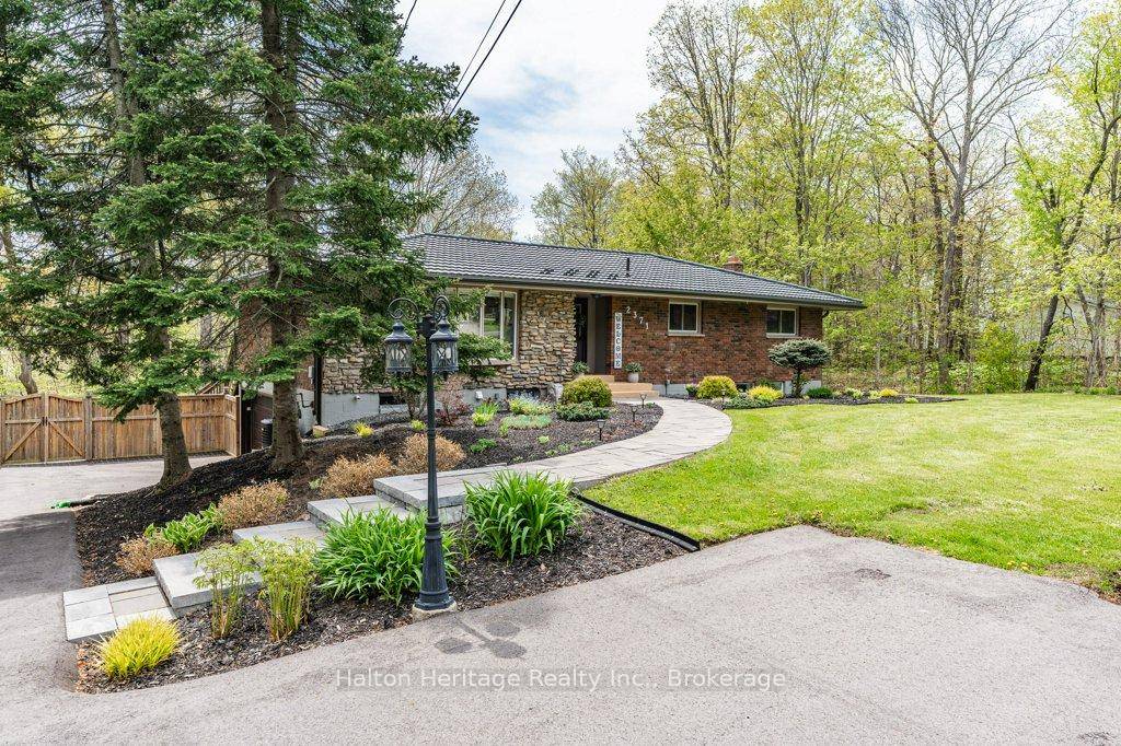 Welcome to this fabulous and beautifully updated bungalow situated in a serene, private and peaceful setting just on the outskirts of Binbrook !