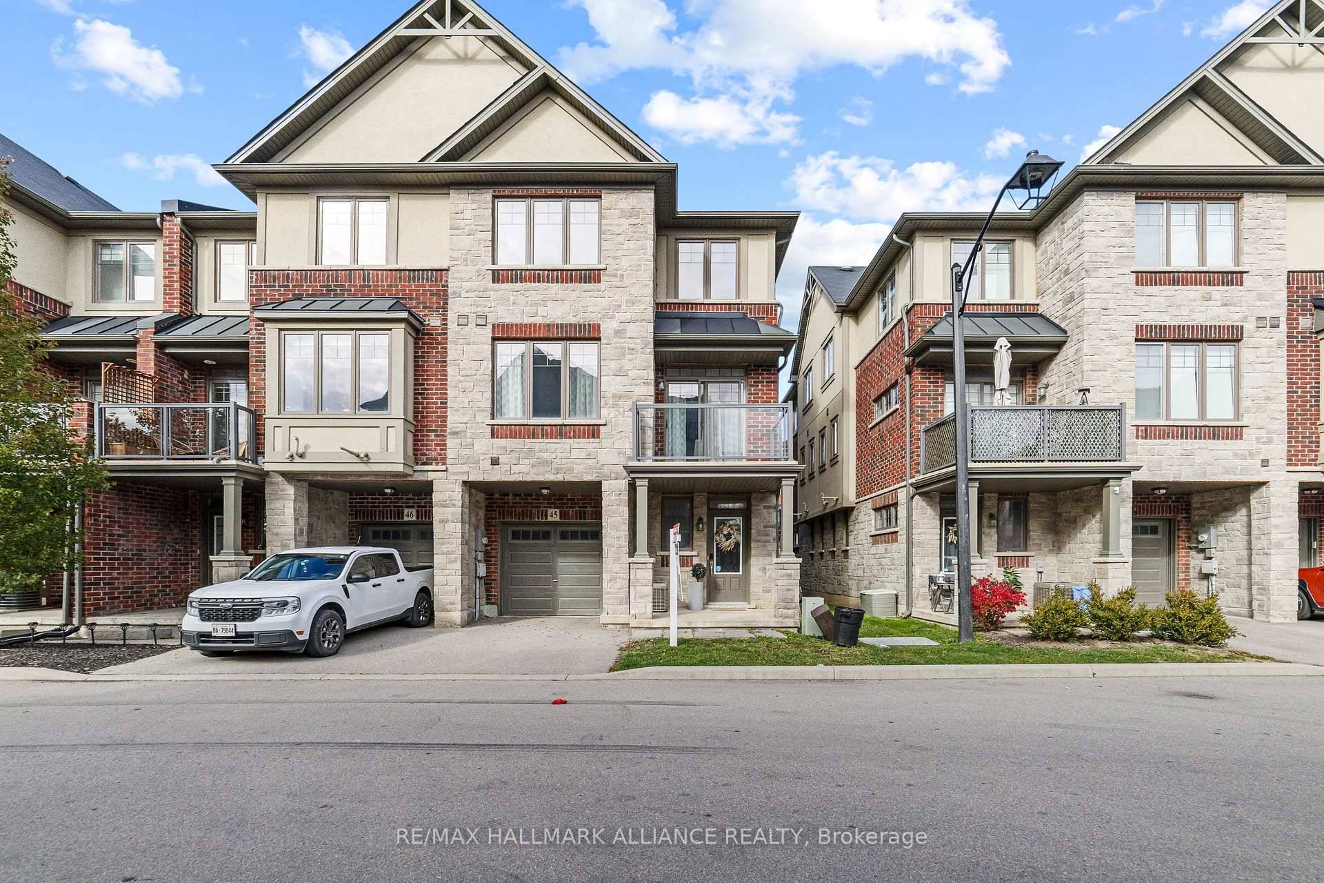 Welcome to this luxurious and bright 3 storey end unit townhome in Ancaster Meadowlands !