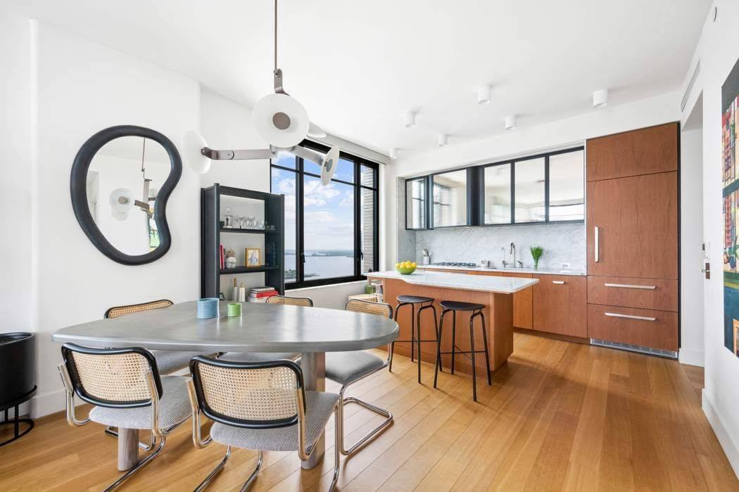Move right into this corner two bedroom, two bathroom condominium home with open city and river views.