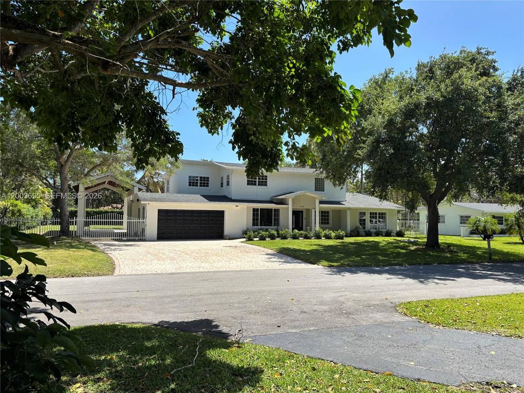 The Palmetto Bay home features approximately 3, 200 sq ft under air, with a total adjusted square footage of 3, 918 sq ft, including generous covered porches and overhangs.