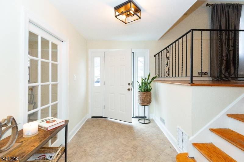 4 Bedroom, 1. 5 bath split level home located in a beautiful, quiet neighborhood right on the border of Scotch Plains.