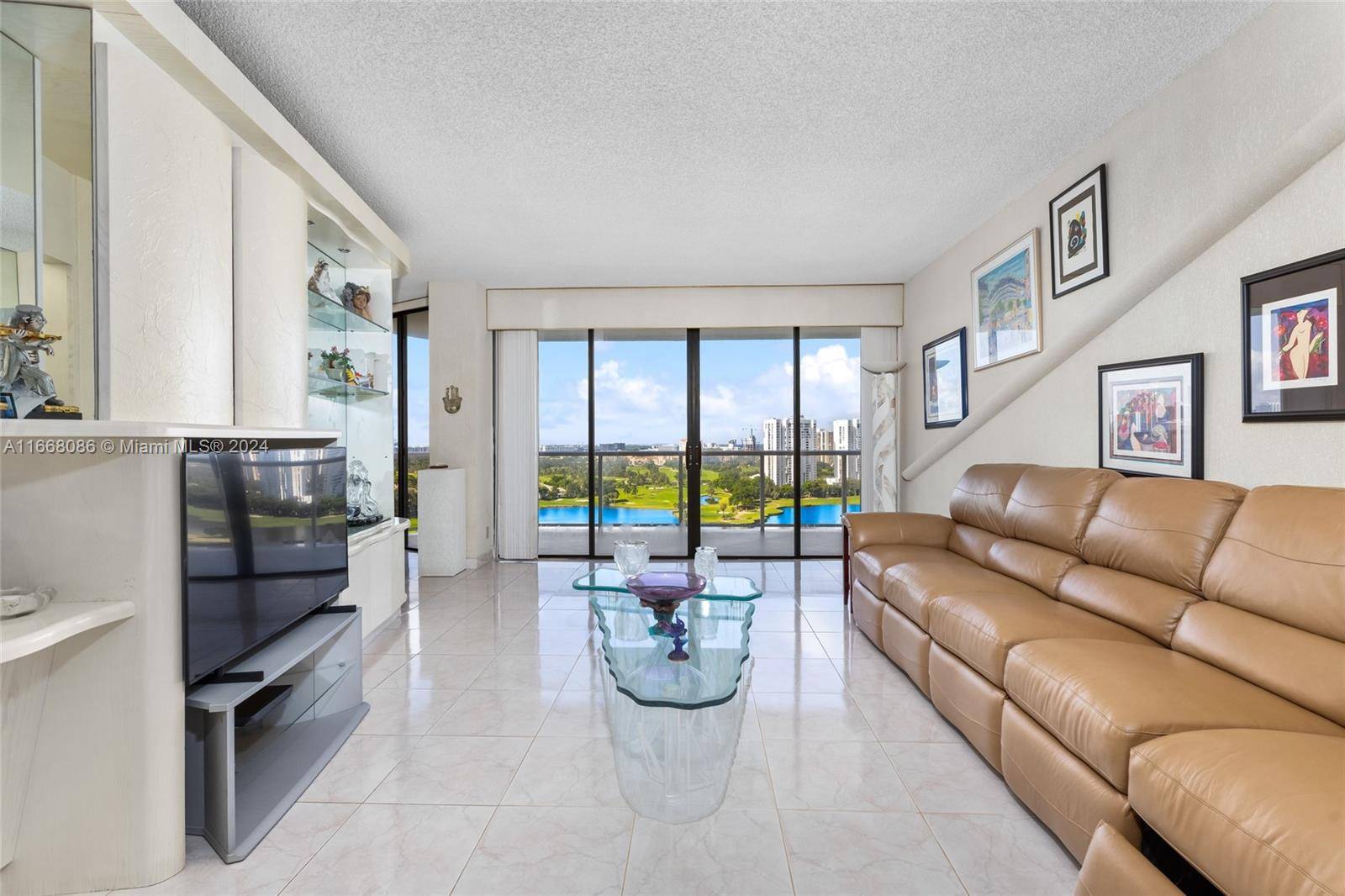 Step into this stunning 2 bedroom, 2 Bath residence with the most spectacular golf and water views.