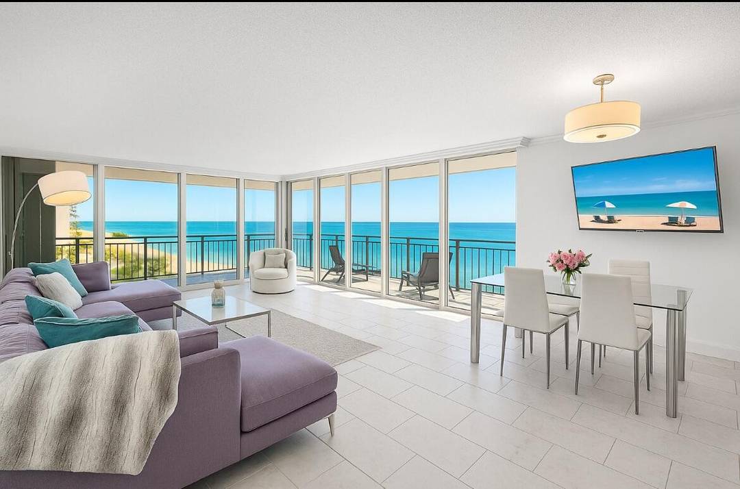 Stunning oceanfront 2BR 2BA corner unit in Highland Beach with a rare wrap around balcony and panoramic views of the Atlantic.