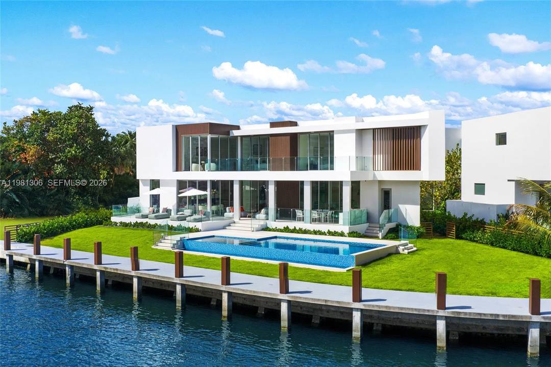 Now Completed ! ! Welcome to 503 Palm Drive, a spectacular brand new waterfront estate in the prestigious guard gated community of Golden Isles in Hallandale Beach.