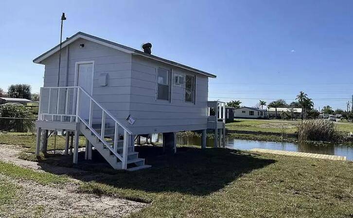Charming 3 bedroom waterfront home with a detached 1 bedroom, 1 bath secondary dwelling guest house.