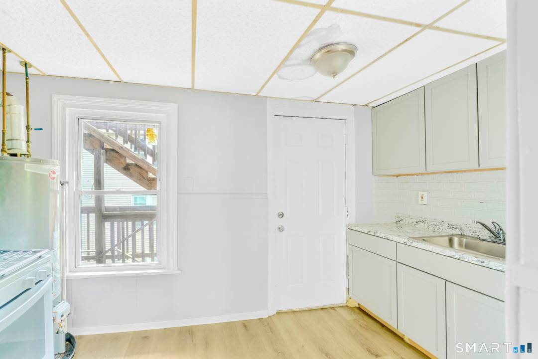 Excellent investment opportunity featuring two separate buildings, each a 3 family apartment, for a total of 6 residential units, located at 67 Burton Street in Waterbury.