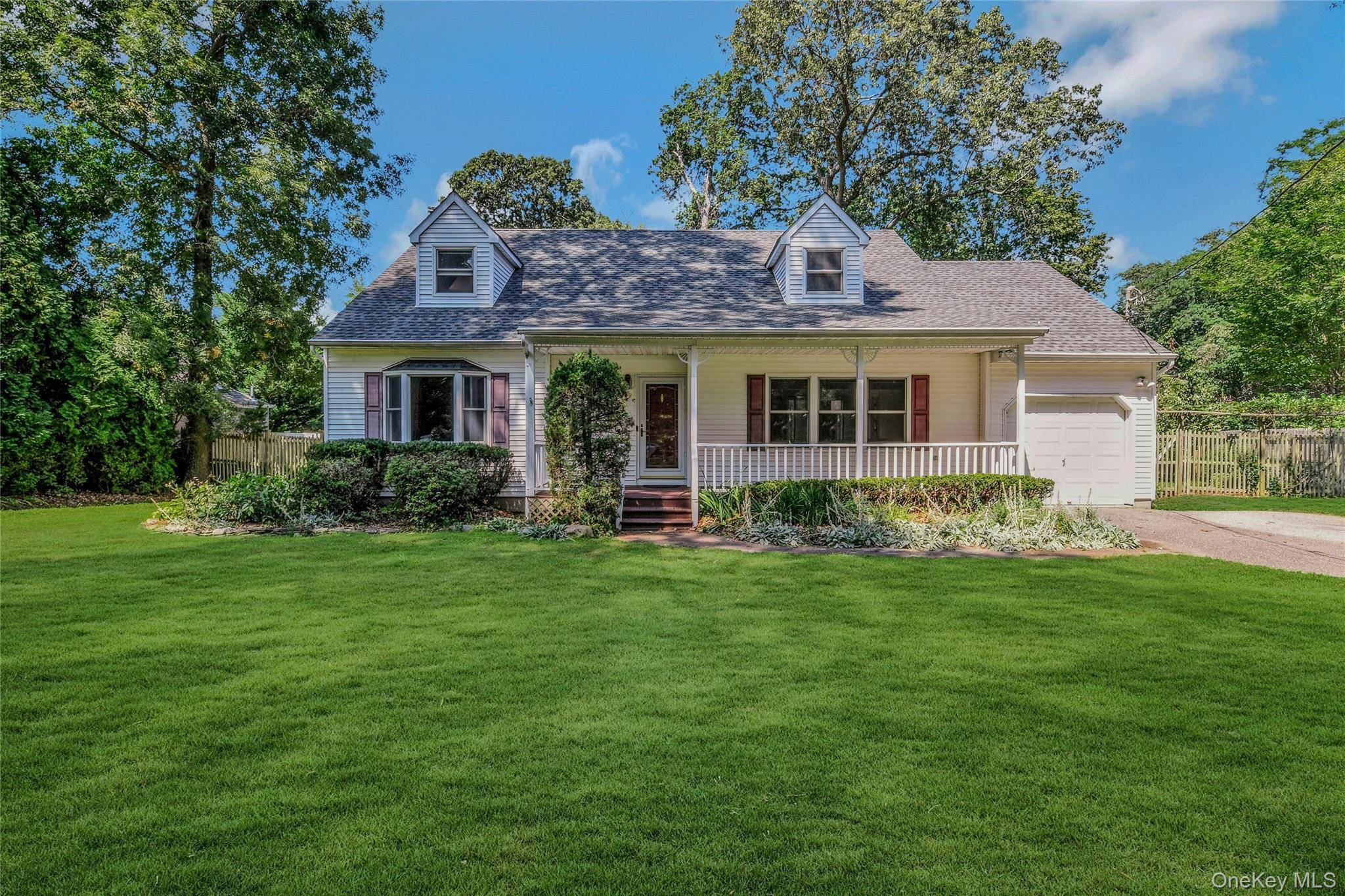 Welcome to this delightful 3 bedroom, 2 bath Cape Cod style Home, Built In 1993 And Nestled in the Vibrant Heart Of Stony Brook.