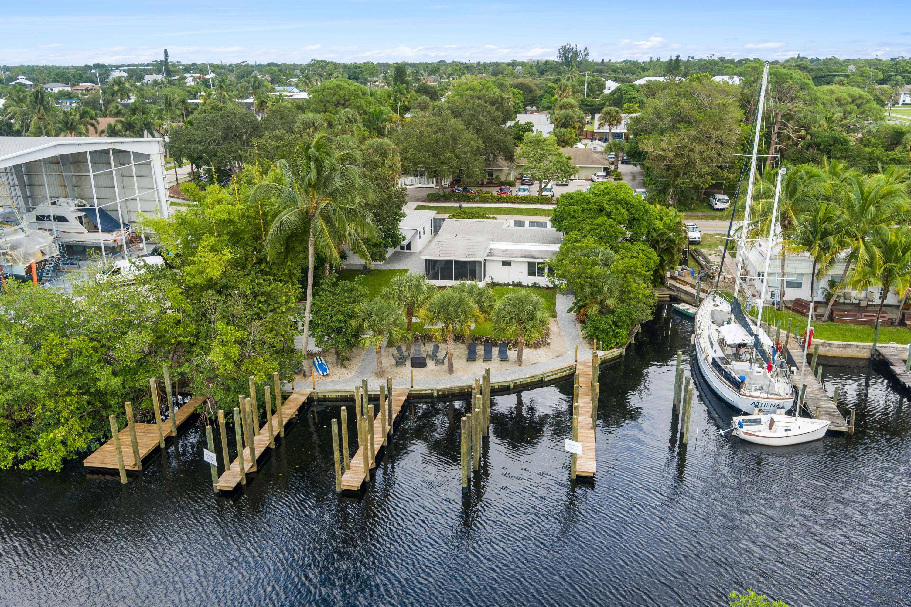 Waterfront 5 bedroom 4 bath furnished with a dock slip on the Manatee Pocket !